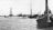 Het vertrekpunt: De buitenhaven van Delfzijl in 1921 met o.a. driemasters en watervliegtuigen